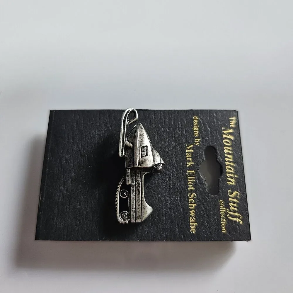 The Mountain Stuff Mark Eliot Schwabe Snowmobile Pin Silver Tone